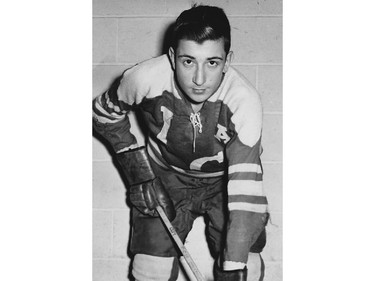 Future Montreal Canadiens defenceman Guy Lapointe poses for a portrait as a young teenager with his Immaculate-Conception team in Montreal.