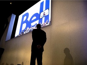 BCE CEO George Cope watches a presentation as he attends the company's AGM in Toronto on Thursday May 9, 2013.