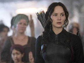 In this image released by Lionsgate, Jennifer Lawrence portrays Katniss Everdeen in a scene from The Hunger Games: Mockingjay Part 1.