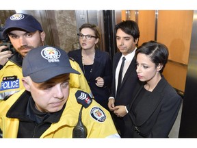 Jian Ghomeshi leaves court in Toronto, Wednesday, Nov.26, 2014. Ghomeshi has been granted bail just hours after being charged with multiple counts of sexual assault.THE CANADIAN PRESS/Nathan Denette