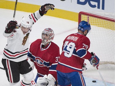Chicago Blackhawks' Jonathan Toews celebrates after scoring on Carey Price during first-period action in Montreal, Tuesday, Nov. 4, 2014.