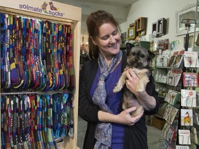 Lorraine Overall, owner of Boutique Écologique P'Lovers, with her dog Chewbacca at her Notre Dame St. store in Montreal.