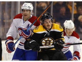 The Canadiens' Max Pacioretty battles for position with the Bruins' Loui Eriksson during game in Boston on Nov. 22, 2014.