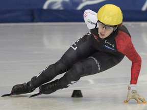 Marianne St-Gelais from Canada skates to a first place finish during her 500-metre quarter-final race at the ISU World Cup Short Track Speedskating competition in Montreal, Saturday, November 15, 2014.