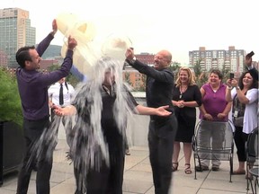 Mayor Denis Coderre does the Ice Bucket Challenge at Montreal City Hall on Thursday, Aug. 21.