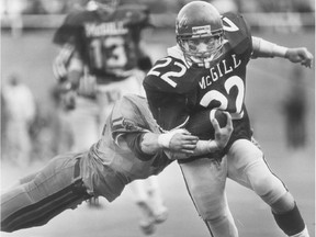 McGill running-back Michael Soles breaks away from a Queen's defender during a 1987 game at Molson Stadium.