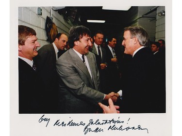 Montreal Canadiens defenceman Guy Lapointe shakes hands with then-Prime Minister Brian Mulroney at the Montreal Forum following the team's 1993 Stanley Cup championship. From left in the photo: Pierre Mondou, Rick Green, Lapointe, Larry Robinson, Serge Savard and Mulroney, who signed the photo for Lapointe.