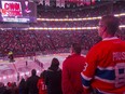 Canadiens fans listen to the national anthem before game against the New York Rangers at the Bell Centre on Oct. 25, 2014.