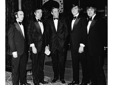 Montreal Canadiens legend Jean Béliveau is surrounded by four future Hall of Famers in this early 1970s photo, including Guy Lapointe at far right. From left: Jacques Lemaire, Frank Mahovlich, Béliveau, Serge Savard, Lapointe.