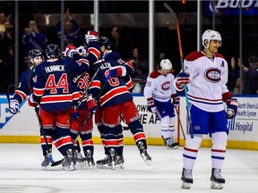 The Rangers celebrate a goal scored by Rich Nash during game against the Canadiens at New York's Madison Square Garden on Nov. 23, 2014. The Rangers won 5-0.