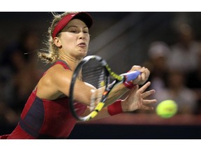 MONTREAL, QUE.: AUGUST 05, 2014 -- Eugenie Bouchard hits a forehand return during her match against American Shelby Rogers at the Rogers Cup tennis tournament in Montreal Tuesday August 05, 2014.  Bouchard lost the match in three sets.   (John Mahoney  / THE GAZETTE) ORG XMIT: 50595-8941