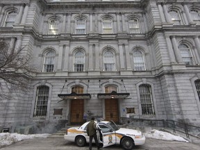 Quebec's anti-corruption squad raids Montreal city hall in February 2013.