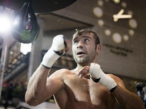 Lucian Bute hits the speed bag during a public training session at Complexe Desjardins in Montreal on Jan. 13, 2014.