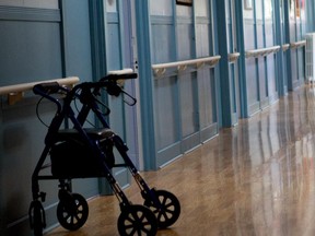 MONTREAL, QUE.: JUNE 28, 2012 -- Elinor Bartlett, a Borden Place resident, walks in the hallway of the seniors home in Montreal Thursday, June 28, 2012 . Residents have been told they have until Aug. 1 to find a new home after an eviction order has been issued because of over 4 years of unpaid rent. (John Kenney/THE GAZETTE)