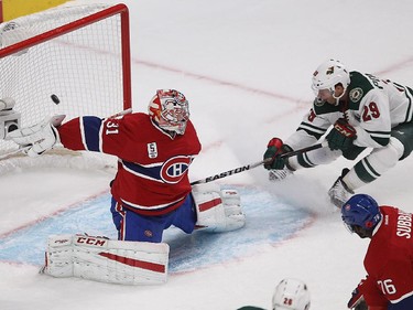 Minnesota Wild's Jason Pominville (29) scores on Montreal Canadiens goalie Carey Price during second period NHL action in Montreal on Saturday November 08, 2014.