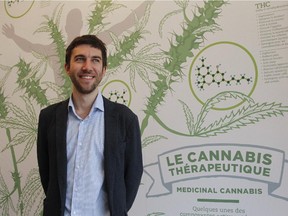 Adam Greenblatt, executive director of Santé Cannabis, in front of a mural on the wall on the clinic on Monday. It opens its doors officially on Tuesday in Montreal. It's the first and perhaps the only medical clinic specializing in medical pot.