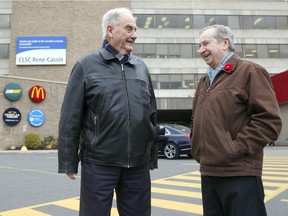 Mel Bercovitch, left, and Gabriel Shears in the parking lot at  the Cavendish Mall, a favourite hangout.