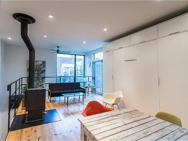 Another view of the main living space at the pied à terre home of artist Luce Meunier in the borough of Plateau-Mont-Royal.