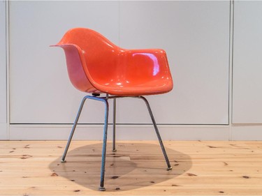 An Eames moulded chair.