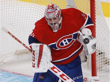 Carey Price of the Montreal Canadiens makes a save against the Boston Bruins in the first period of an NHL game Thursday, November 13, 2014 at the Bell Centre in Montreal.