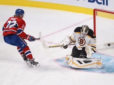 Dale Weise of the Montreal Canadiens scores on a penalty shot against Niklas Svedberg of the Boston Bruins in the second period of an NHL game at the Bell Centre in Montreal, Thursday, November 13, 2014.