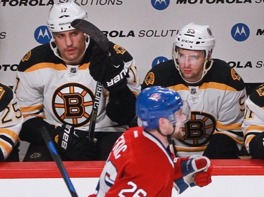 Jiri Sekac of the Montreal Canadiens celebrates his goal in the third period (the team's fifth) as he skates by Boston Bruins players Milan Lucic (left) and Seth Griffith in an NHL game Thursday, November 13, 2014 at the Bell Centre in Montreal.