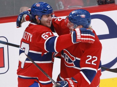 Montreal Canadiens players Max Pacioretty (left) and Dale Weise celebrate a goal by Pacioretty against the Boston Bruins in second period on an NHL game Thursday, November 13, 2014 at the Bell Centre in Montreal.