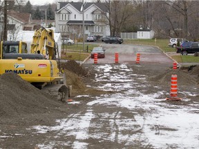 Construction equipment on an extension of Boisé Street in Île-Perrot. Work to complete the road will continue in spring.