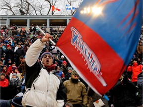 Fans at Molson Stadium cheer for the Alouettes en route to a 50-17 win over the B.C. Lion in the CFL East Division semifinal on Nov. 16, 2014. Only 15,107 fans showed up at Molson Stadium for the playoff game.