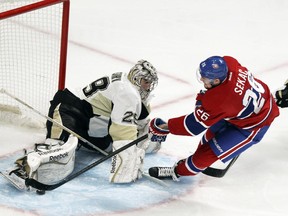 Montreal Canadiens' Jiri Sekac is stopped by Pittsburgh Penguins goalie Marc-André Fleury after beating defenceman Simon Despres to the net during National Hockey League game in Montreal Tuesday, Nov. 18, 2014.