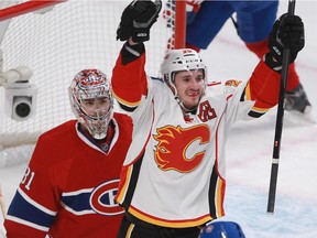 The Calgary Flames' Curtis Glencross celebrates in front of Canadiens goalie Carey Price after scoring goal in 6-2 win over Montreal at the Bell Centre on Nov. 2, 2014.