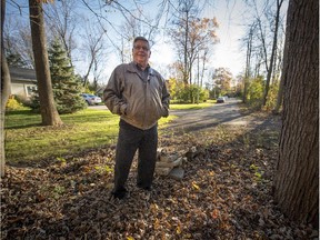 Mike Leger at the end of McKenzie St. in Senneville. Leger is one of the owners of the vacant lots on McKenzie and wants a commitment from city to extend the road on McKenzie Ave. so these lots can be developed.