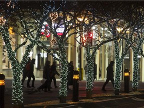 MONTREAL, QUE.: NOVEMBER 20, 2014 --GENERIC STOCK CHRISTMAS STREET SCENE-- Christmas trees lining McGill College on Thursday November 20, 2014. (Pierre Obendrauf / MONTREAL GAZETTE)