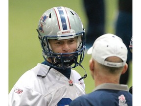 MONTREAL, QUE.: NOVEMBER 20, 2014 -- Montreal Alouettes wide receiver Dave Stala has a talk with head coach Tom Higgins at practice at the Bell Sports Complex in Brossard near Montreal Thursday, November 20, 2014.  The team is preparing  for Sunday's CFL East Division final in Hamilton against the Tiger-Cats. (John Kenney / MONTREAL GAZETTE)