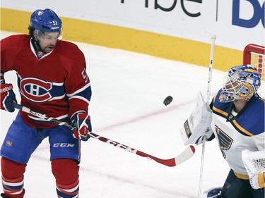 Montreal Canadiens David Desharnais can't get his stick on rebound in front of St. Louis Blues goalie Jake Allen during second period of National Hockey League game in Montreal Thursday November 20, 2014.