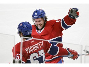 MONTREAL, QUE.: November 20, 2014 -- Montreal Canadiens David Desharnais celebrates with Max Pacioretty after Pacioretty scored his second goal of the game in the third period against the St. Louis Blues during National Hockey League game in Montreal Thursday November 20, 2014. ({John Mahoney / MONTREAL GAZETTE)