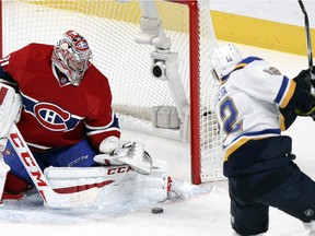 Montreal Canadiens goalie Carey Price makes a pad save against St. Louis Blues Jori Lehtera during third period of National Hockey League game in Montreal Thursday November 20, 2014.