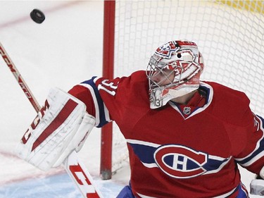 Montreal Canadiens goalie Carey Price makes a blocker save in third period of  National Hockey League game against the St. Louis Blues in Montreal Thursday November 20, 2014.
