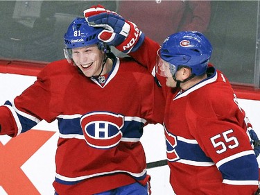Montreal Canadiens Lars Eller, left, celebrates his third-period goal against the St. Louis Blues with teammate Sergei Gonchar during National Hockey League game in Montreal Thursday November 20, 2014.
