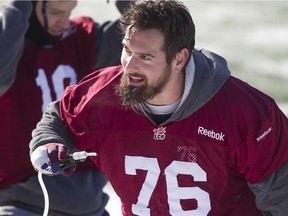 Alouettes defensive-lineman Scott Paxson, who is a diabetic, gets some fluids during break in practice on Nov. 21, 2014 at Molson Stadium.