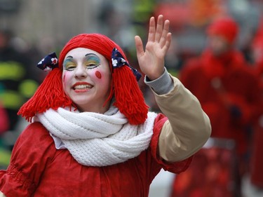 A participant in Raggedy-Ann look takes part in the 64th edition of the downtown Santa Claus parade in on Ste-Catherine St. in Montreal Saturday, November 22, 2014. (