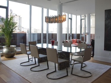 MONTREAL, QUE.: NOVEMBER 24, 2014 -- Dining area on the first floor of a Ritz-Carlton Residence penthouse in Montreal, Monday November 24, 2014.  (Vincenzo D'Alto / Montreal Gazette)