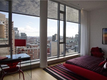MONTREAL, QUE.: NOVEMBER 24, 2014 -- Guest  bedroom on the second floor with windows facing south at a Ritz-Carlton Residence penthouse in Montreal, Monday November 24, 2014.  (Vincenzo D'Alto / Montreal Gazette)