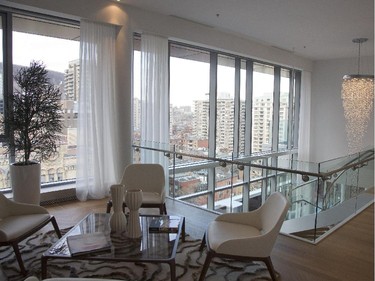 MONTREAL, QUE.: NOVEMBER 24, 2014 -- Living room on the second floor with windows facing Sherbrooke street  at a Ritz-Carlton Residence penthouse in Montreal, Monday November 24, 2014.  (Vincenzo D'Alto / Montreal Gazette)