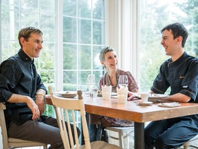 La Table des Gourmets owners Thierry Rouyé, left, and Pascale Rouyé with their son Maxime Rouyé in Val-David.