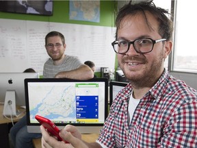 Sam Vermette,right, Guillaume Campagna are the heads of Transit App in their Montreal office on Wednesday November 26, 2014. The smartphone app combines all the different transit agencies of a city into one place the schedules, real-time data for cities that have GPS on buses and or metro. They are currently operating in 87 cities.