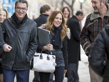 Pierre Karl Péladeau's partner Julie Snyder walks on the street outside Parti Québécois headquarters in Montreal Thursday November 27, 2014.