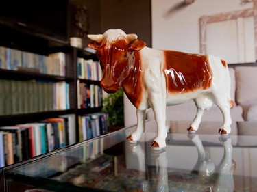 A ceramic cow in the den at Havie Walker's home.