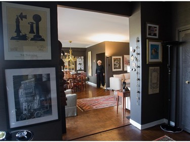 A view of the living room and dining room from the den area.