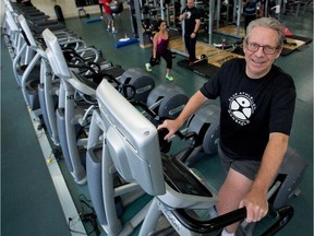 Michael Shetler works out on an AMT (Adaptive Motion Trainer) trainer at Club Mansfield. He is recovering from a serious head injury.